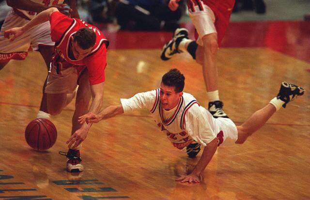 Brandon Bakke dives after a loose ball during Fresno State’s game against Utah in late February 1996 at Selland Arena. The Bulldogs upset the nationally ranked Utes (No. 8) that night, with Bakke scoring three points in the Bulldogs’ 71-68 victory.